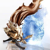 Stylized Mugler Angel visual with blue ice, swirling brown texture, and metallic leaves.
