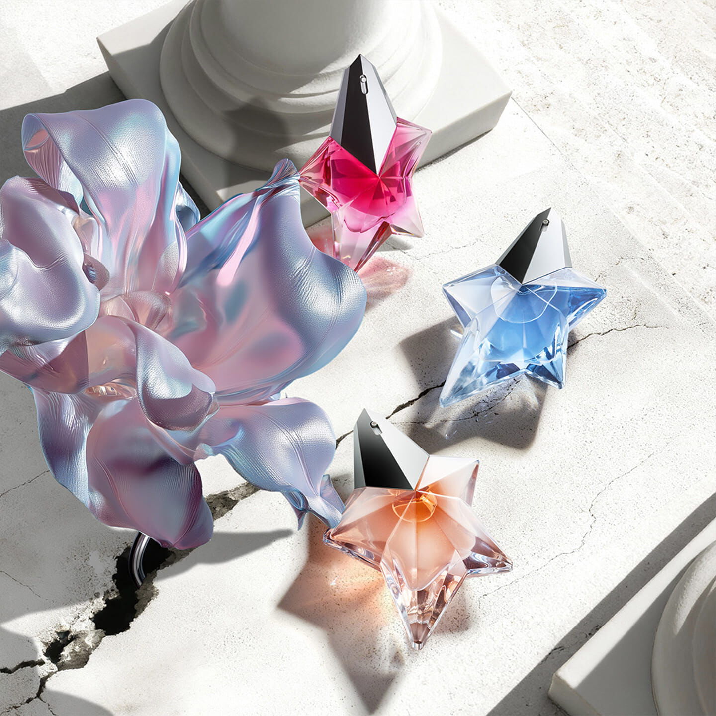 Mugler Mother's Day 2026 campaign banner featuring the iconic Angel franchise perfume bottles in a celestial floral and Parisian landscape, celebrating extraordinary mothers.