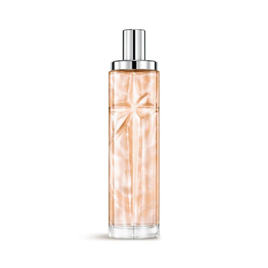 New Starlicious Pineapple Musk packshot, a crystal-clear bottle filled with shimmering amber juice which captures the summer light in a carved shooting star, its facets shining bright beneath a sleek silver cap.
