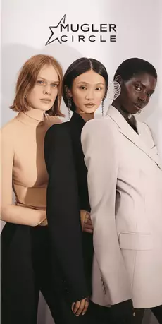 Three models posing in neutral and black tailored outfits.