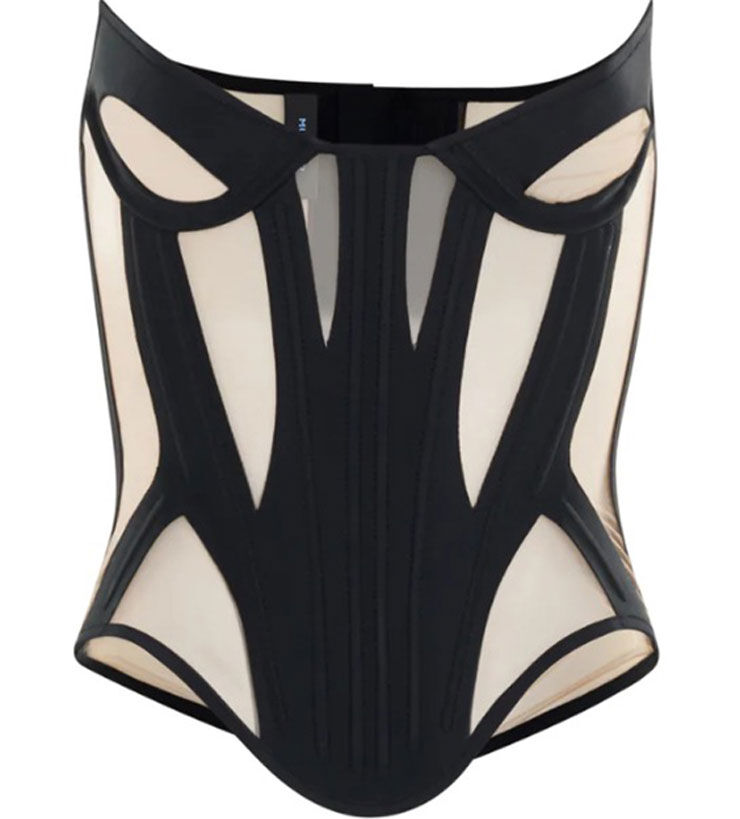 A black and beige corset featuring a structured design with cut-out details and a high neckline.