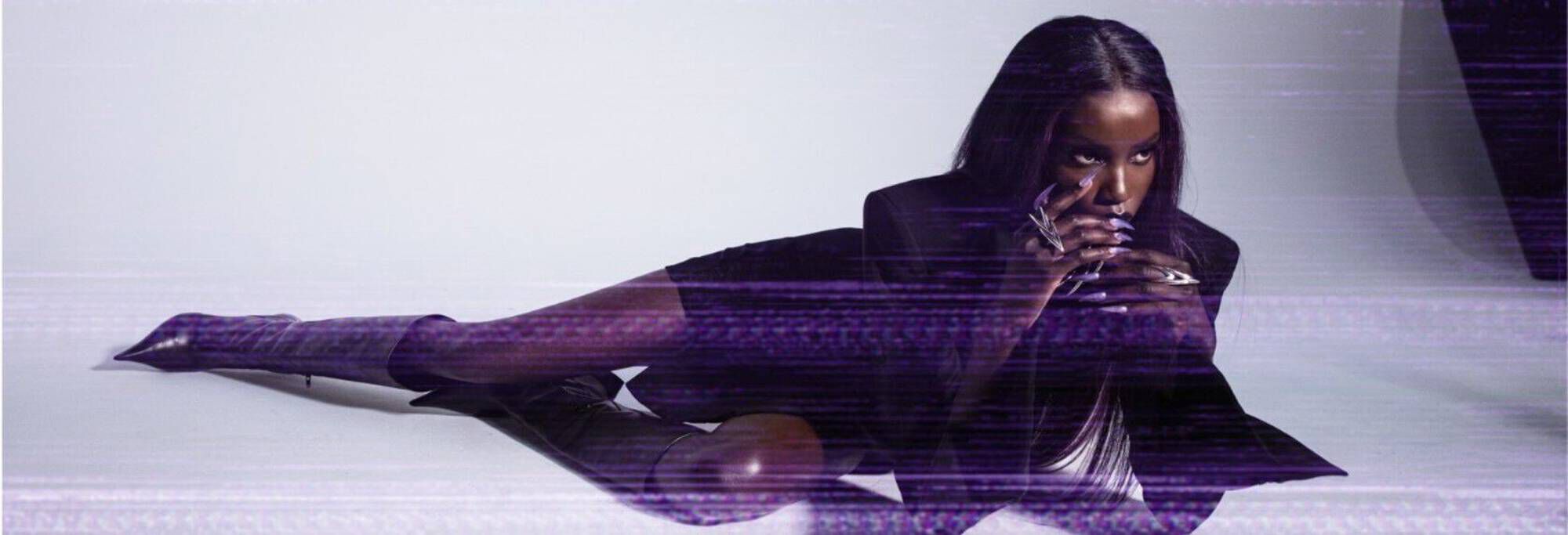 Still showcasing a model from Mugler's Alien Hypersense campaign.