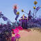 A vibrant purple perfume bottle surrounded by colorful flowers and lush foliage against a bright blue sky.