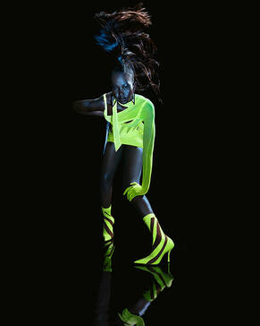 Aweng Ade-Chuol wears sock ankle boot