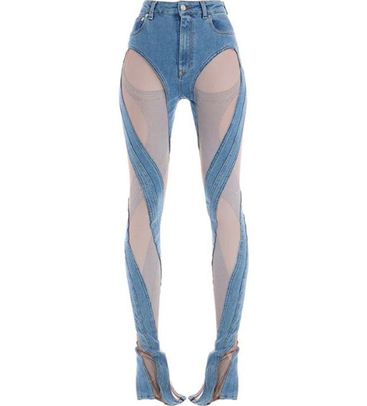 A pair of blue denim jeans featuring cut-out sections with nude mesh panels, creating a bold and unique design.