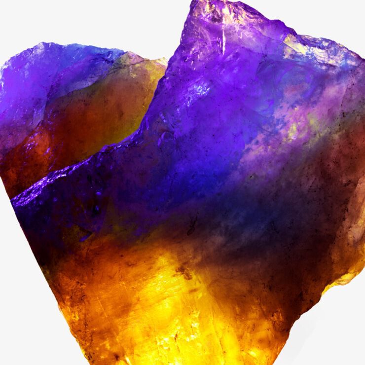 A soft, glowing background of shimmering gold and orange particles, creating a warm and ethereal atmosphere.