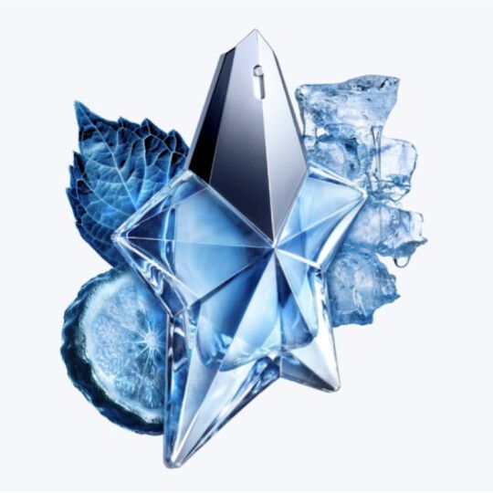 Angel eau de parfum bottle with ingredients surrounding it
