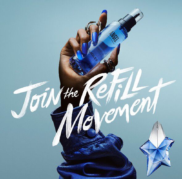 Mugler advertisement with a hand holding a blue refill bottle, featuring the text 'Join the Refill Movement' and the iconic star-shaped Angel perfume bottle in the corner.