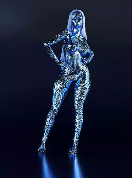 A futuristic figure with a shimmering, metallic skin pattern stands confidently against a dark background.