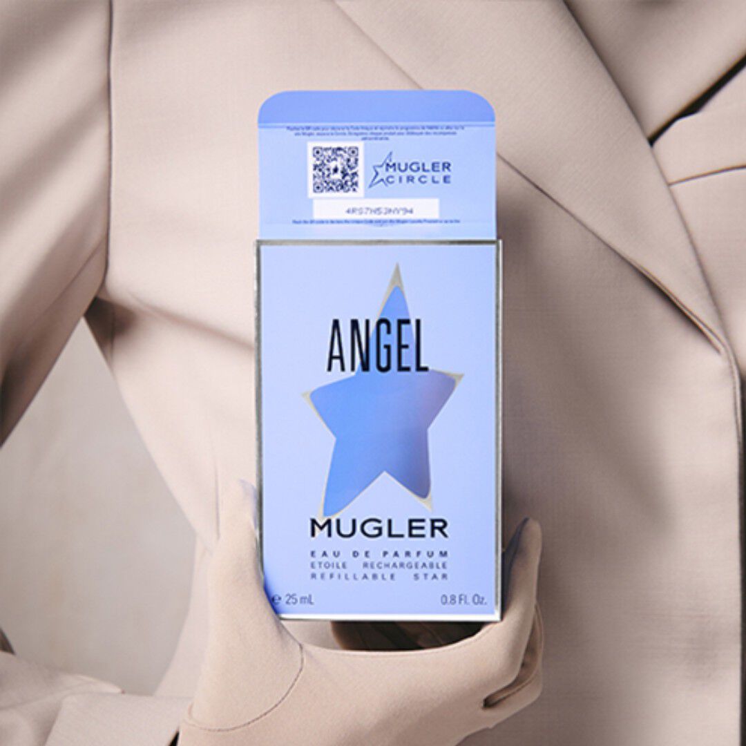Close-up of Mugler Angel perfume box with Mugler Circle code.