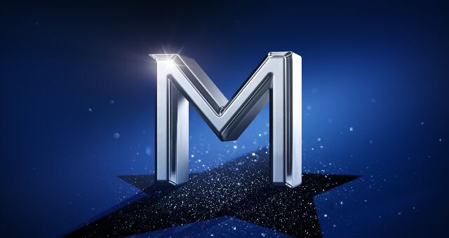 Shiny, metallic letter "M" on a deep blue background with a sparkle effect.