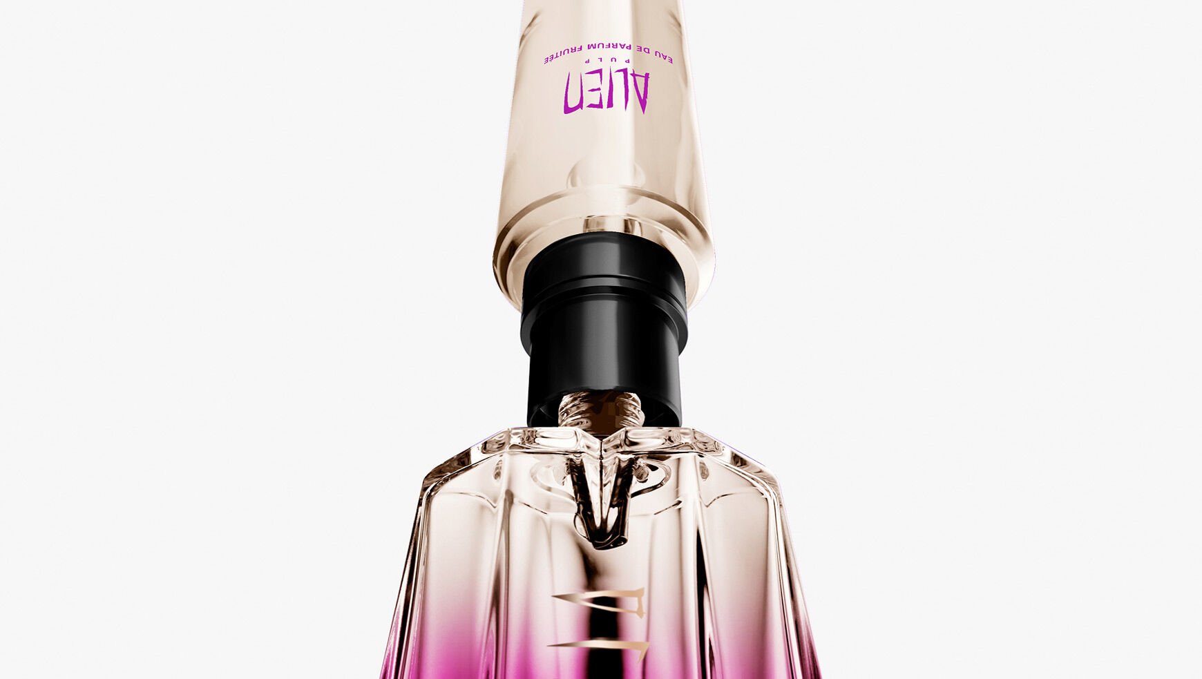 Detailed close-up of the Mugler Alien Pulp bottle's gold and black refillable mechanism, highlighting its practical and sustainable design.