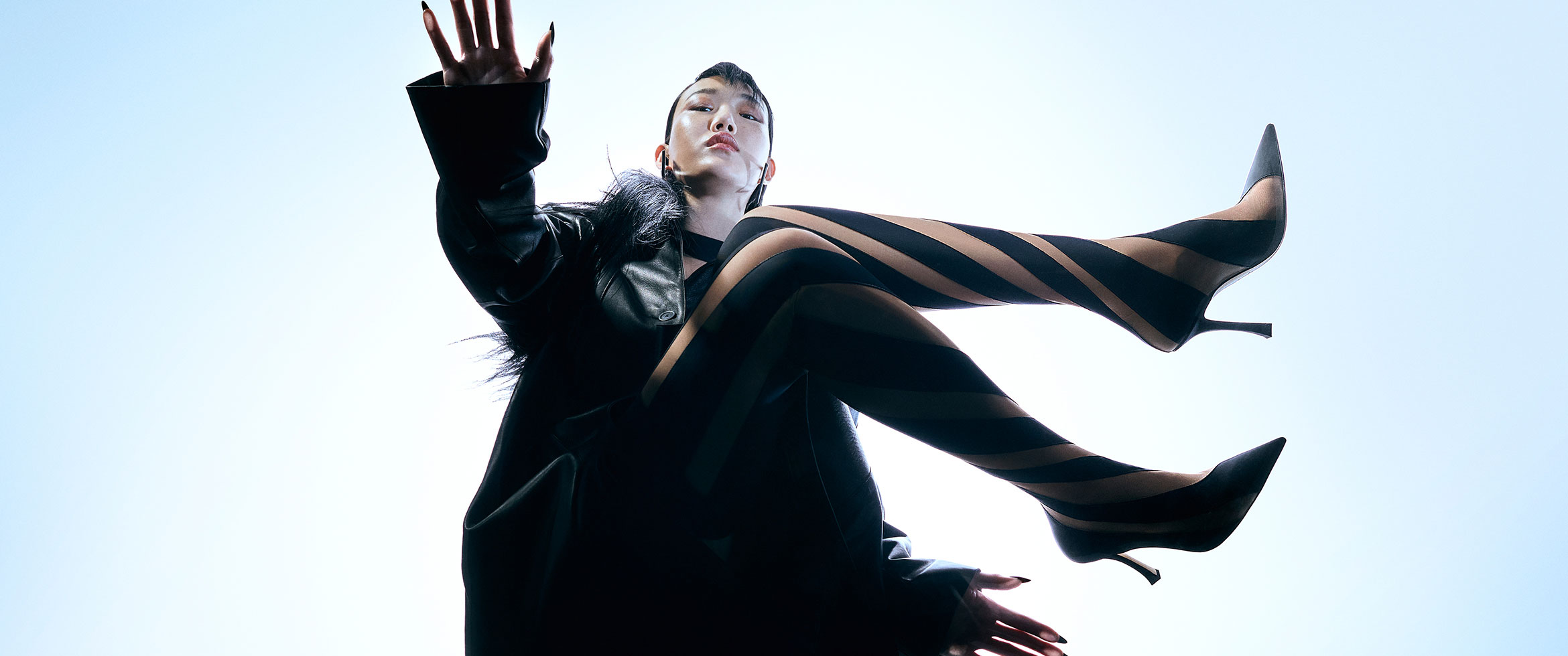 Sora Choi wears jimmy choo/mugler sock otk boot