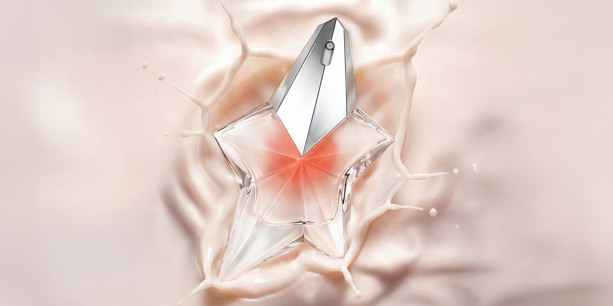 A star-shaped glass perfume bottle splashing into a smooth, creamy pink liquid.